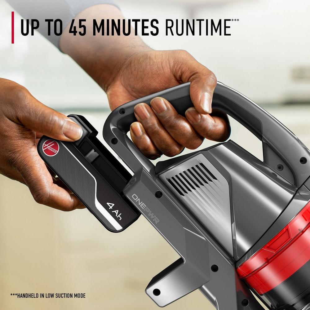 Close-up of a person inserting a ONEPWR battery into a hoover vacuum cleaner, with text reading "up to 45 minutes runtime."