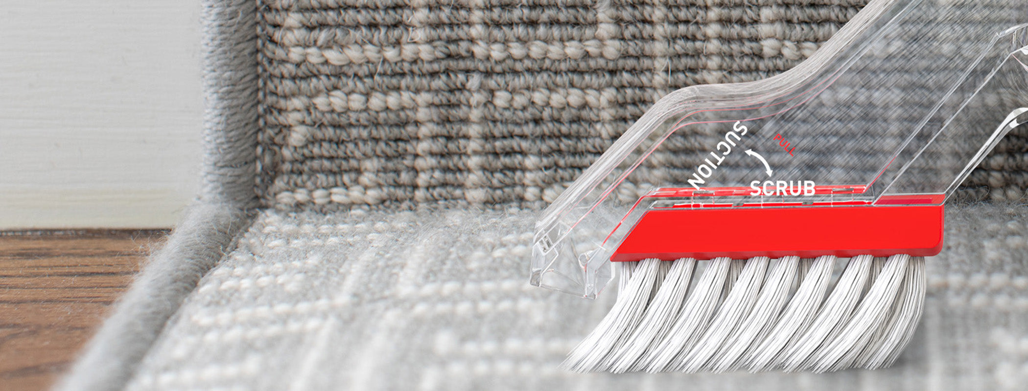 Hoover tight spot tool is shown in the crevices of stairs, displaying its ability to reach tight spots