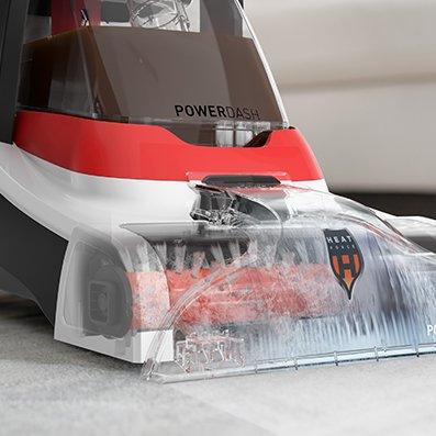 Close-up of the PowerSpin™ pet brush roll on a Hoover carpet cleaner, designed to loosen pet messes effectively, showcasing its cleaning capabilities.