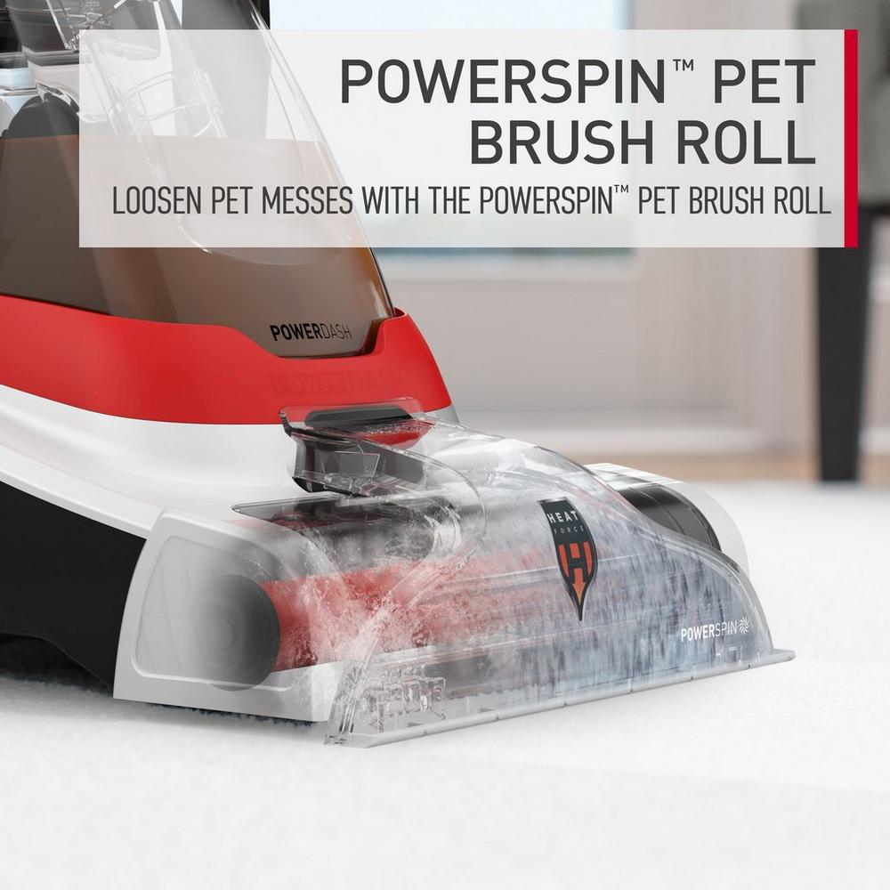 Close-up of the PowerSpin™ pet brush roll on a Hoover carpet cleaner, designed to loosen pet messes effectively, showcasing its cleaning capabilities.