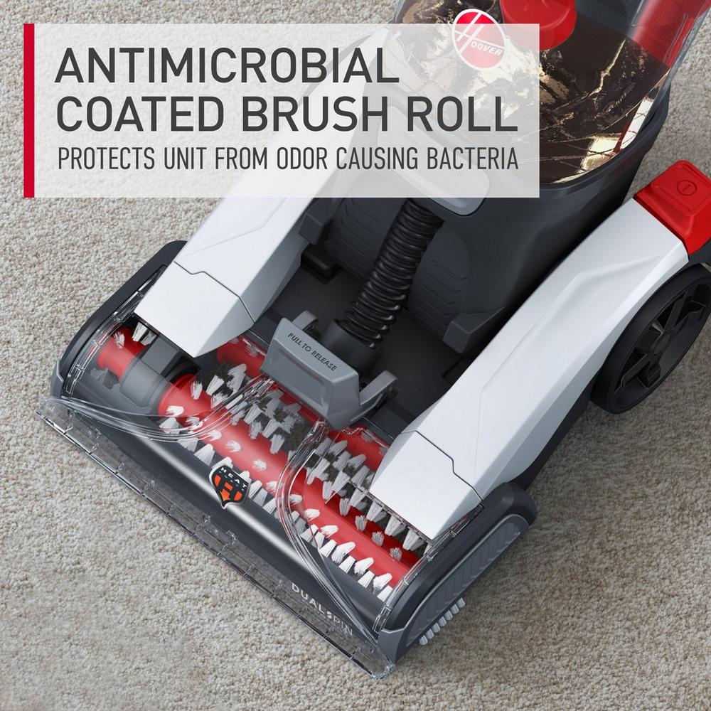 Close-up of the antimicrobial coated brush roll in a carpet cleaner, designed to protect the unit from odor-causing bacteria for enhanced cleanliness.