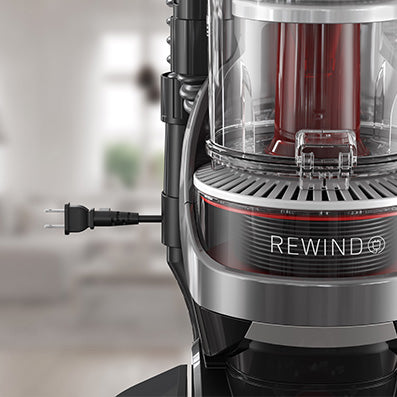Close up of the Hoover vacuum cleaner's 25 ft automatic cord rewind feature, highlighting convenient storage and easy use.