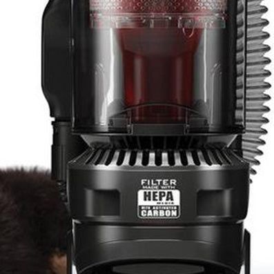 Close up of the Hoover windtunnel high performance pet vacuum cleaner's HEPA filter, emphasizing the filter's HEPA and carbon technology, designed to capture dust, allergens, and pet hair effectively