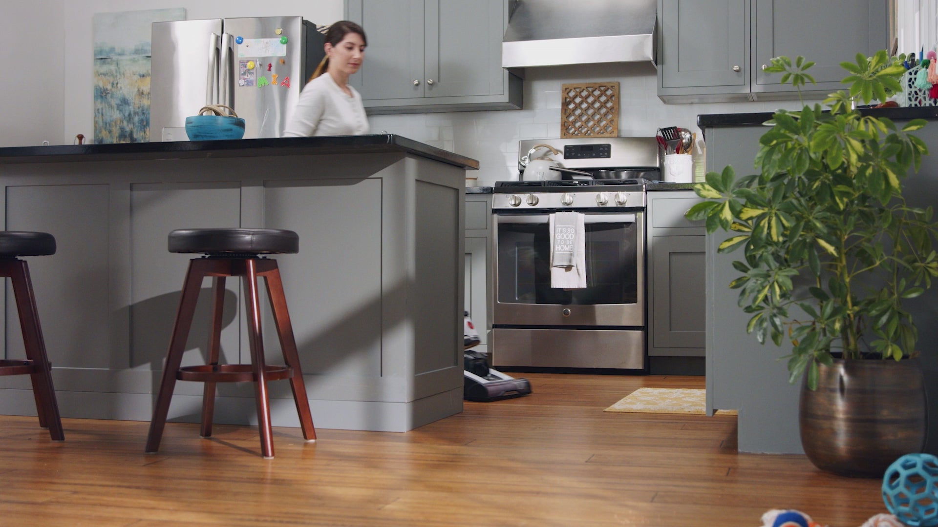Load video: Hoover vacuum cleaner in action easily maneuvering around furniture as it vacuums messes from all floor types and multiple surfaces.