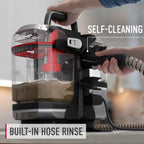 Close up of Hoover spot cleaner with built in hose rinse feature and self cleaning function highlighting the ease of maintenance