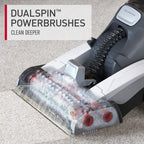 Close-up of DualSpin™ PowerBrushes from a carpet cleaner, designed to clean deeper by effectively removing dirt and stains from carpets.