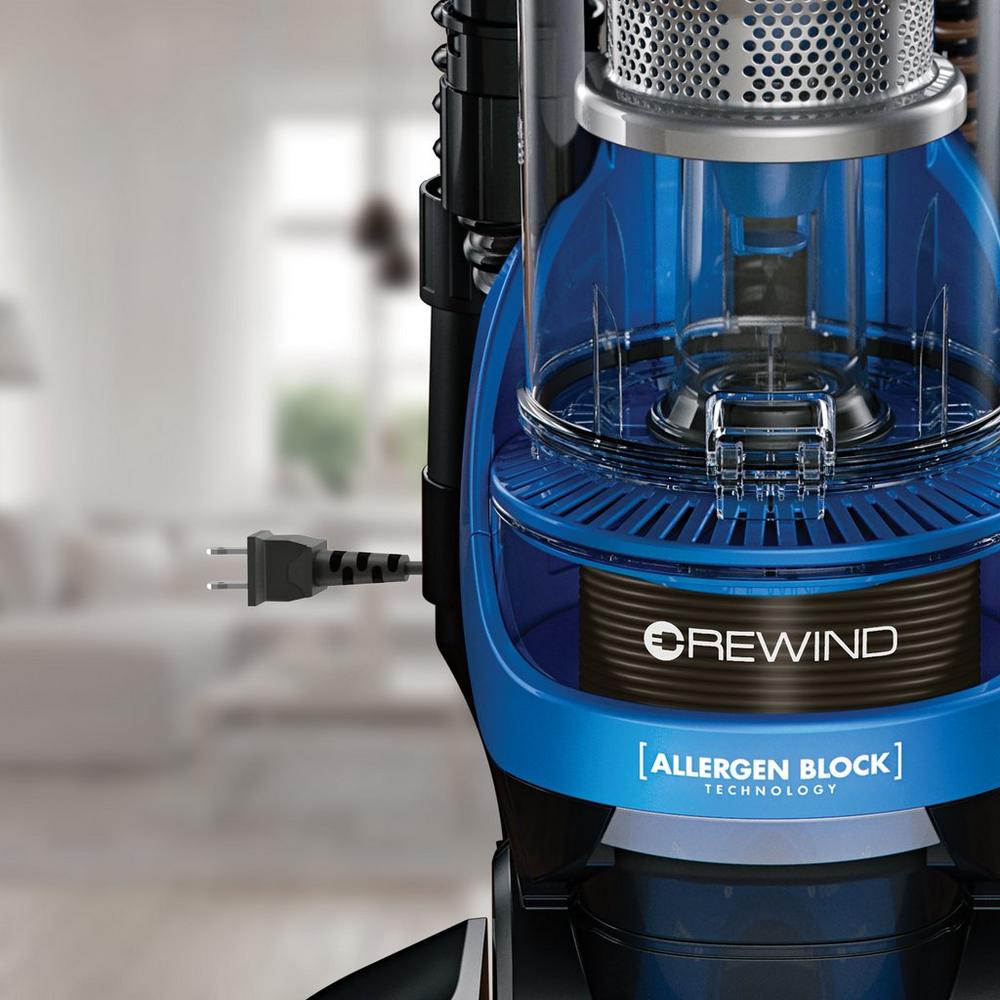 Close up of the Hoover Rewind vacuum cleaner's allergen block technology and rewind feature, highlighting advanced filtration and convenient cord management 