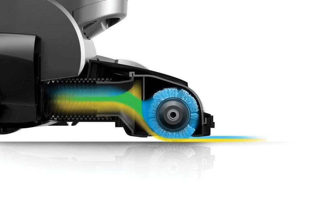 Side Close up view inside the vacuum cleaner's brushroll and suction pathway, illustrating the airflow design.  