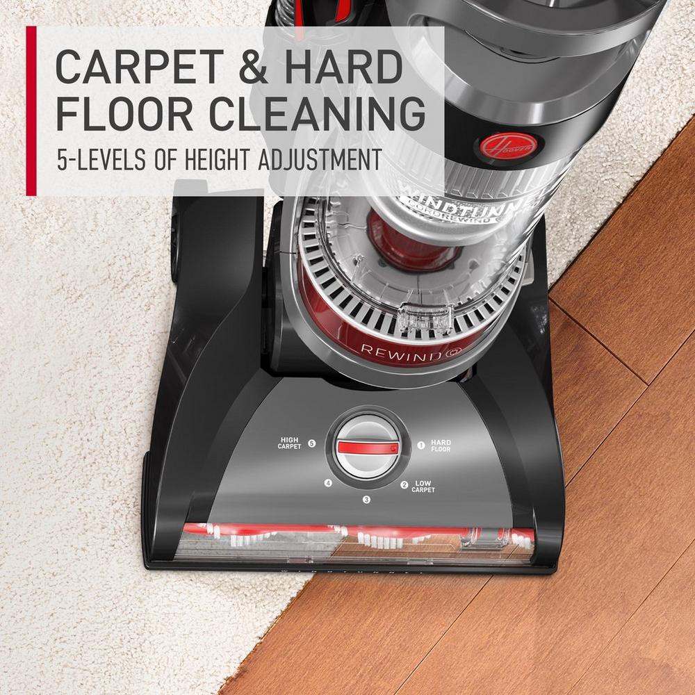 Top view of Hoover windtunnel cord rewind pro vacuum cleaner designed for carpet and hard floor cleaning, featuring 5 levels of height adjustment for optimal cleaning .  