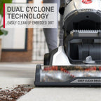 Close up of Hoover vacuum cleaner with dual cyclone technology easily cleaning up embedded dirt.
