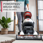 Hoover vacuum cleaner in action featuring the powerpass brush roll, optimal for cleaning carpets.