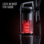 Close up of hoover vacuum cleaner dust bin with red cyclonic filtration system, featuring text "Lock in dust for good," highlighting dust containment technology 