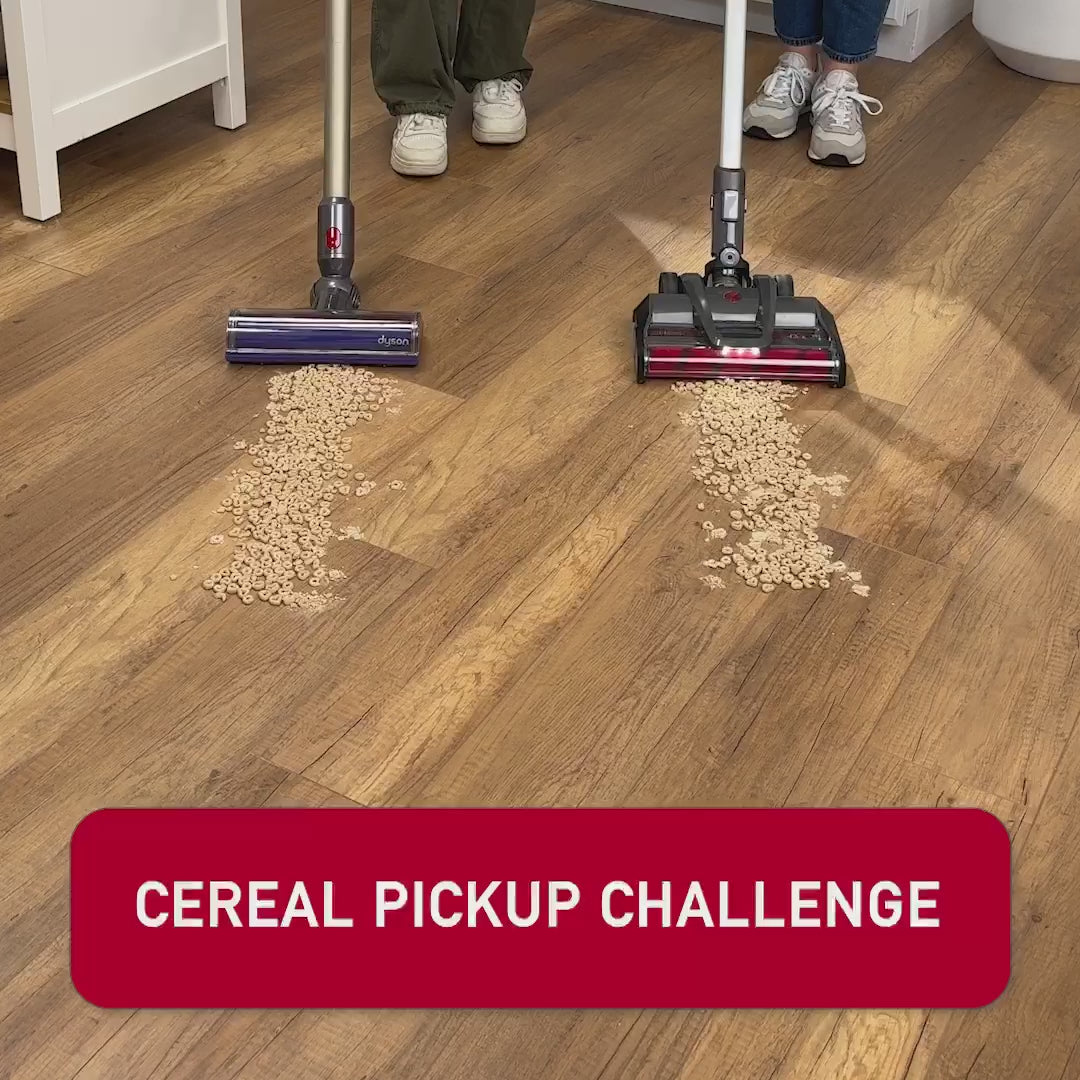Video of The Hoover ONEPWR Emerge Pet All-Terrain cleaning cereal off the floor against a Dyson Vacuum. Hoover cleans up all the cereal while Dyson pushes it around and leaves behind a mess.